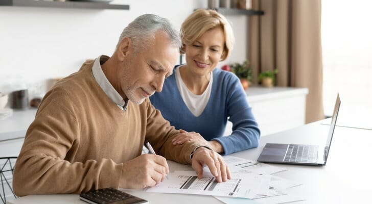 inspirated retired couple dealing with utility bills payment.jpg s1024x1024w